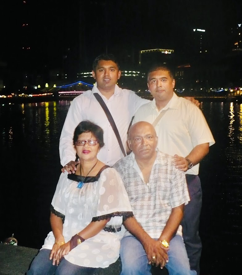 Ranjiv with family in Singapore